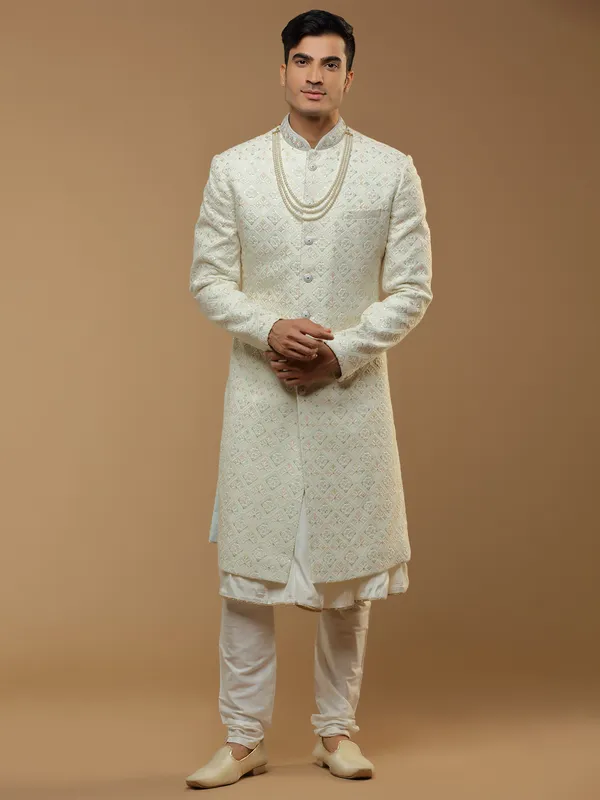 Cream hued silk fabric designer sherwani for mens