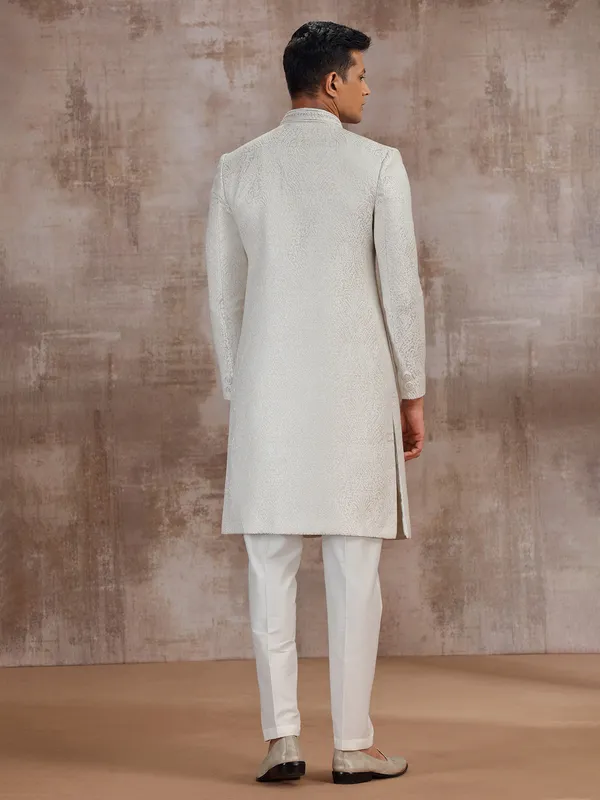 Cream jacquard wedding sherwani for groom
