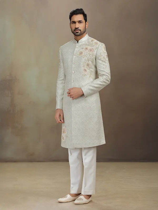 Cream jacquard wedding wear sherwani