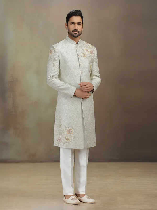 Cream jacquard wedding wear sherwani