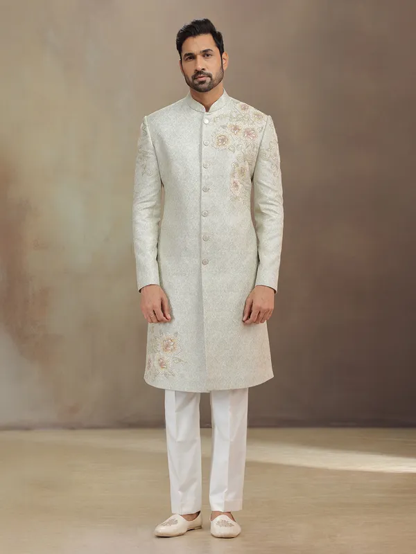 Cream jacquard wedding wear sherwani