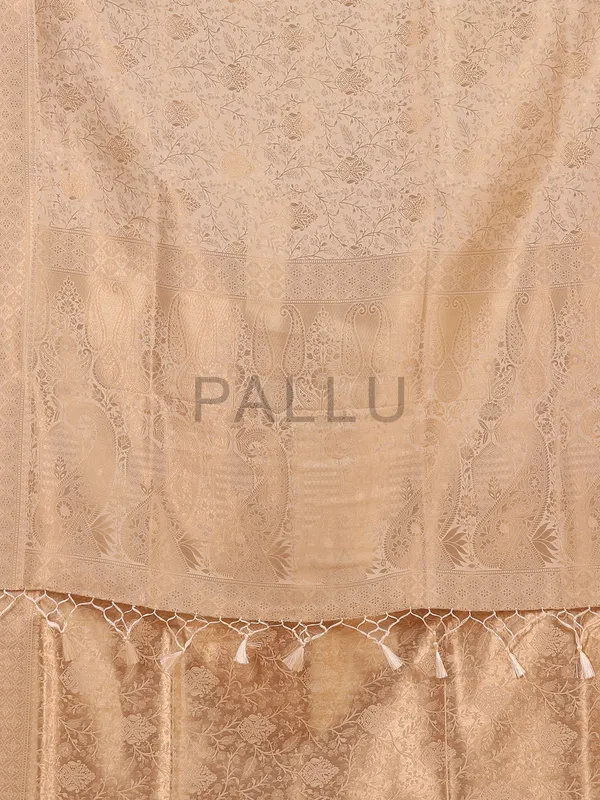 Cream kanjivaram silk saree for festive wear