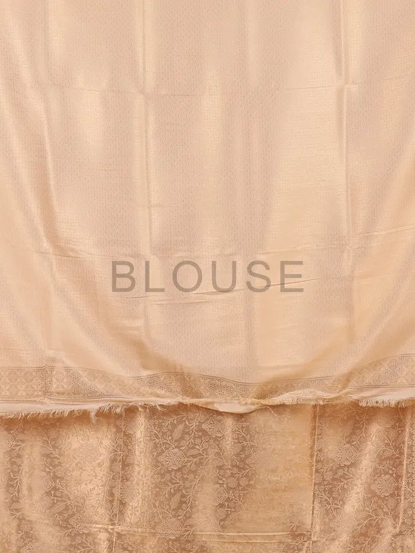 Cream kanjivaram silk saree for festive wear