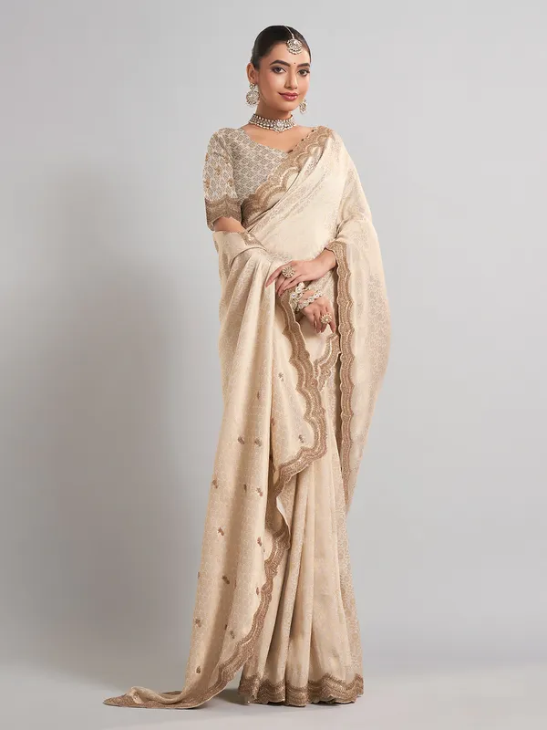 Cream kanjivaram silk saree with classic zari weaving