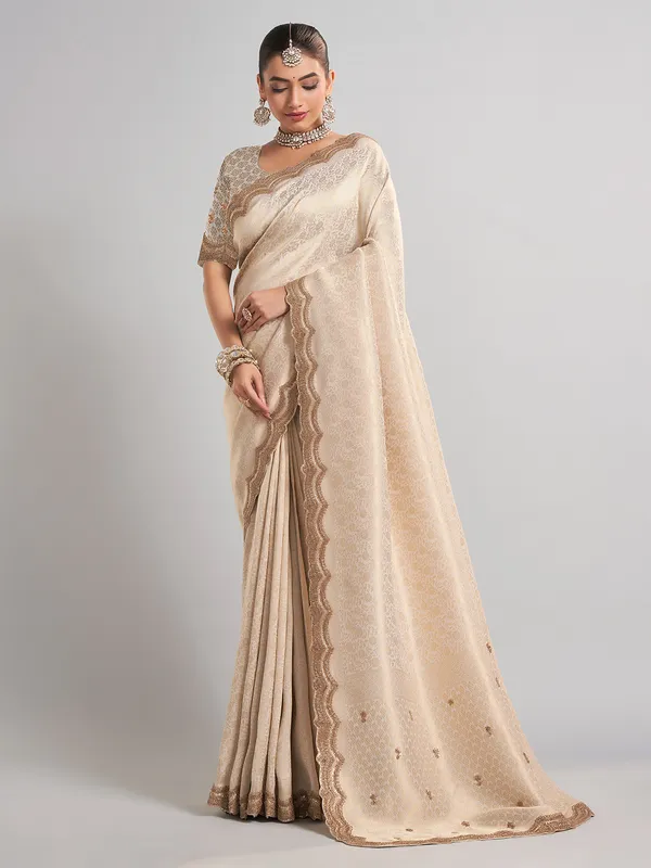 Cream kanjivaram silk saree with classic zari weaving