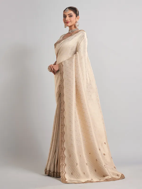 Cream kanjivaram silk saree with classic zari weaving