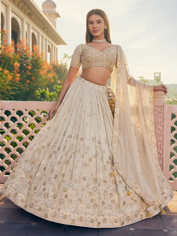 Cream lehenga choli with dupatta in georgette
