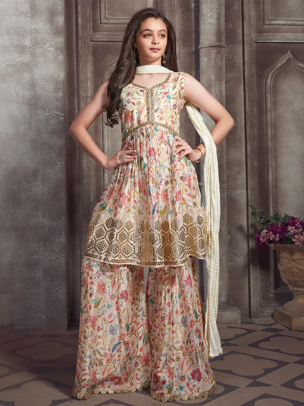 Cream muslin silk printed sharara suit
