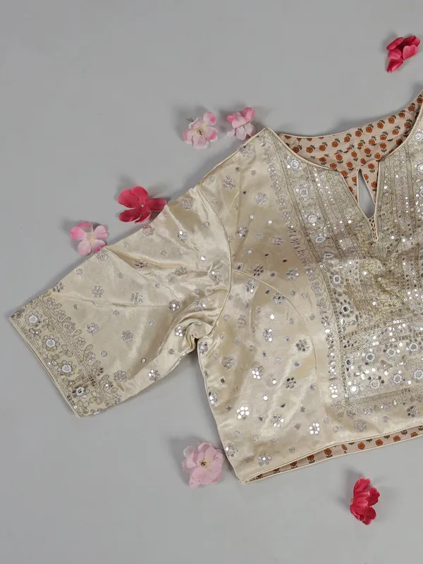 Cream organza saree with ready made blouse