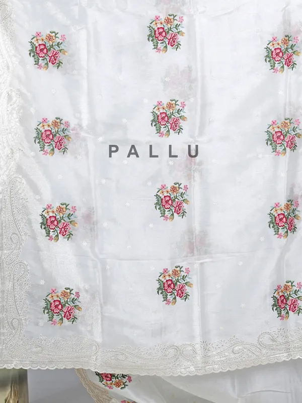 Cream organza saree with sequins detailing