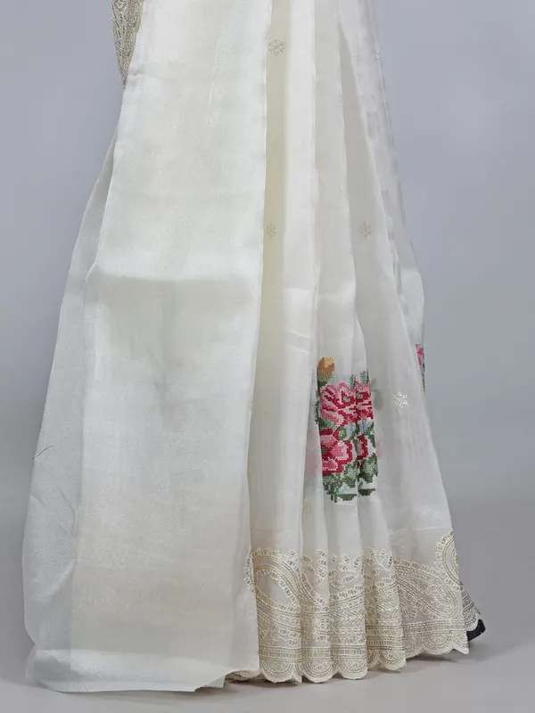 Cream organza saree with sequins detailing