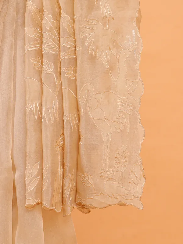 Cream organza saree with unstitched blouse