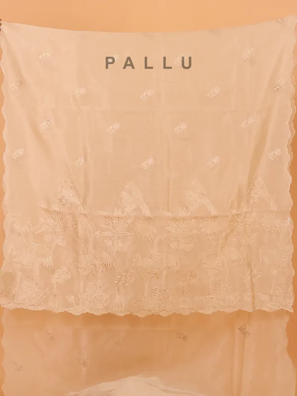 Cream organza saree with unstitched blouse