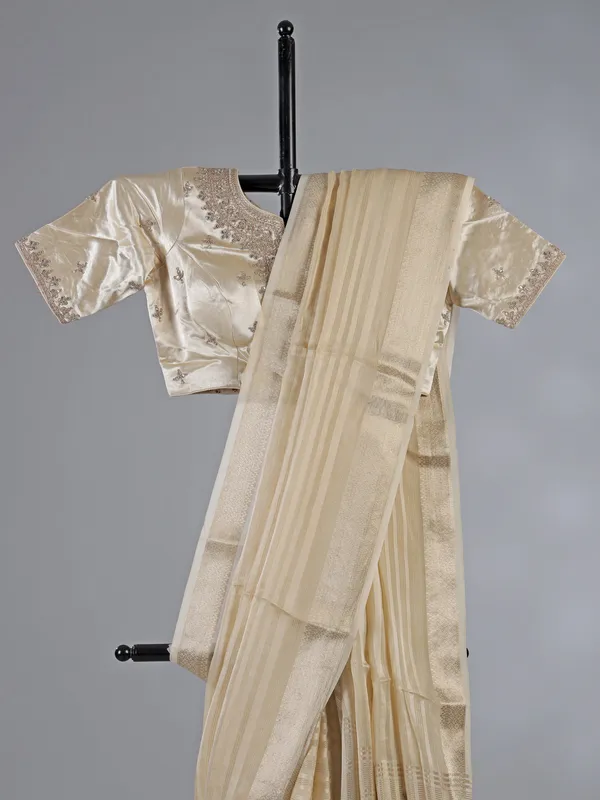 Cream organza satin silk saree with zardosi work