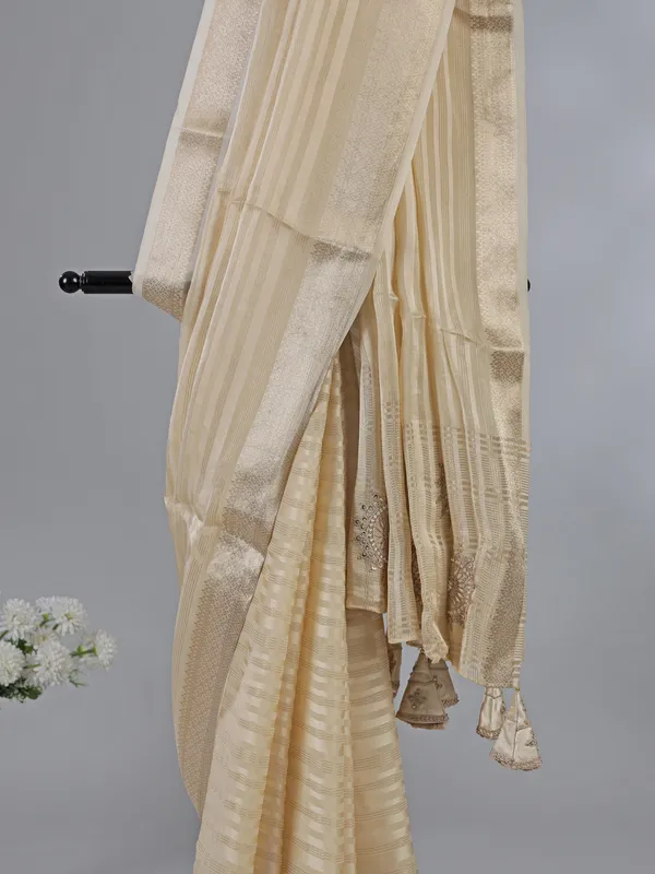 Cream organza satin silk saree with zardosi work