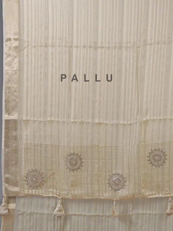 Cream organza satin silk saree with zardosi work