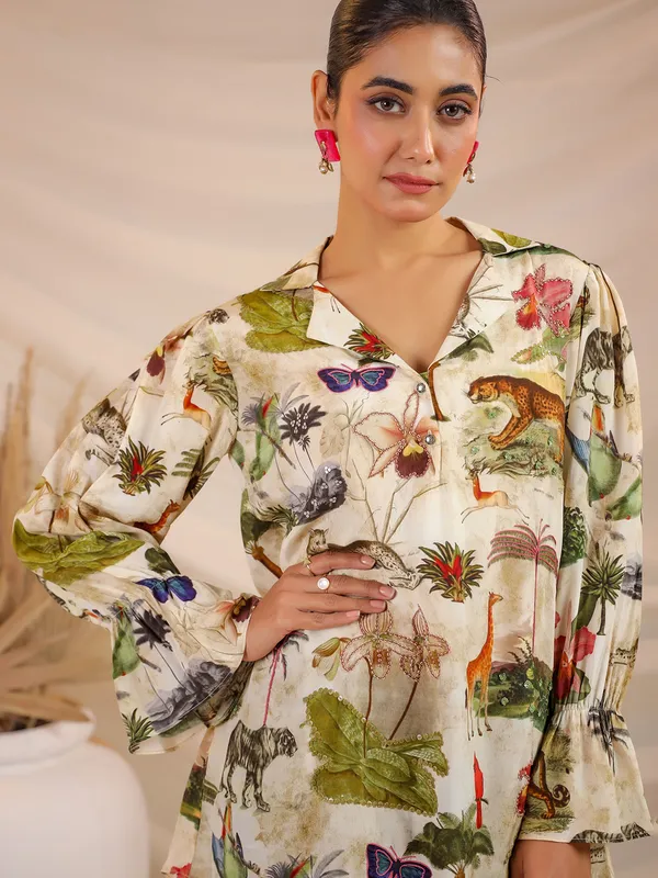 Cream printed crepe top with sequins work