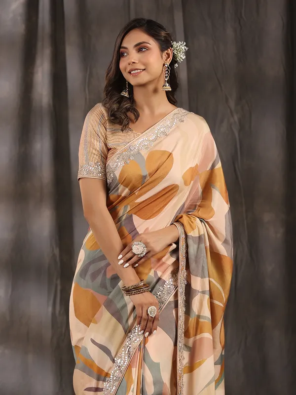 Cream printed muslin saree for festive