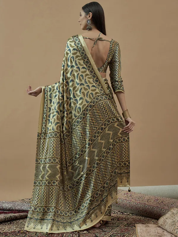 Cream printed saree in japan satin