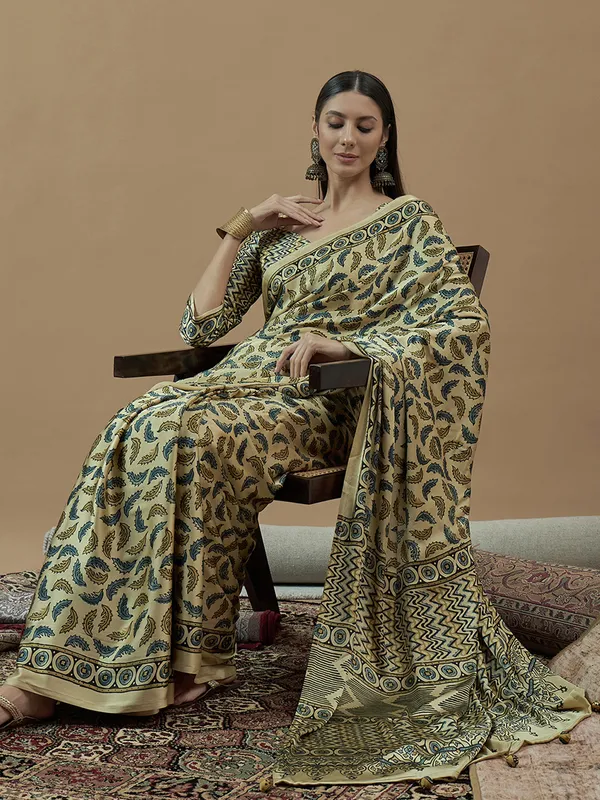 Cream printed saree in japan satin