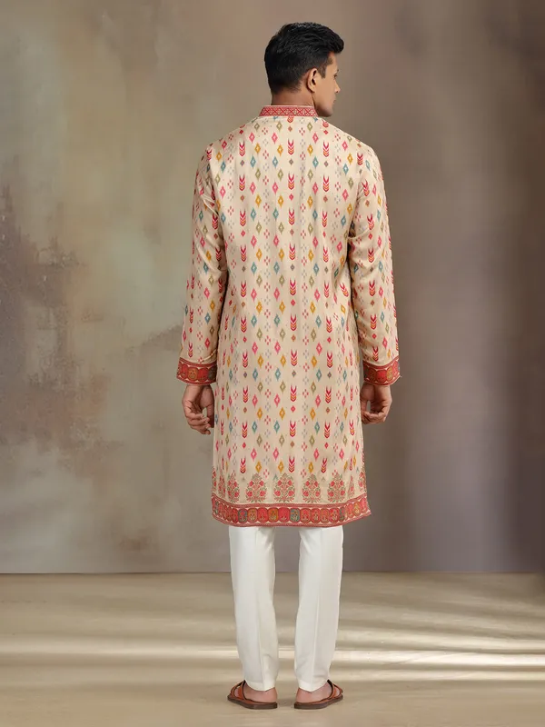 Cream printed silk kurta suit for festive wear