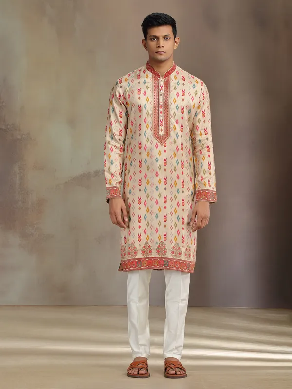 Cream printed silk kurta suit for festive wear