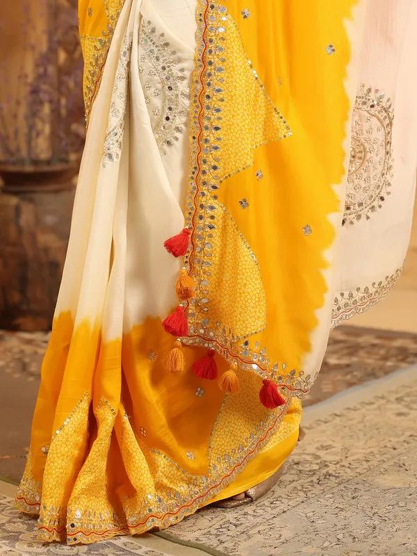 Cream printed silk saree for festive wear