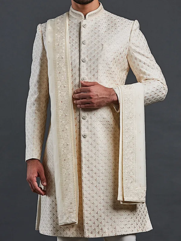Cream raw silk groom style sherwani