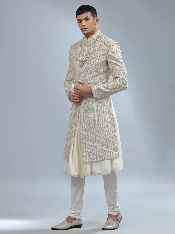 Cream raw silk peshwai sherwani for groom