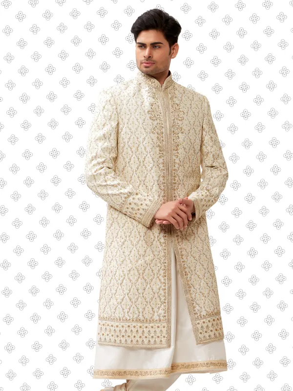 Cream raw silk peshwai style sherwani for groom