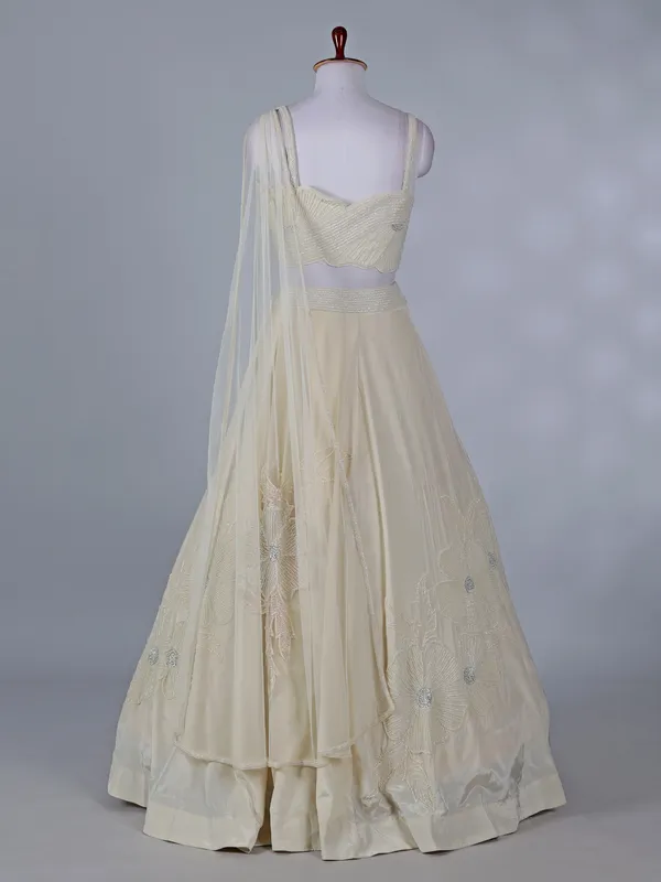Cream reception wear silk lehenga choli