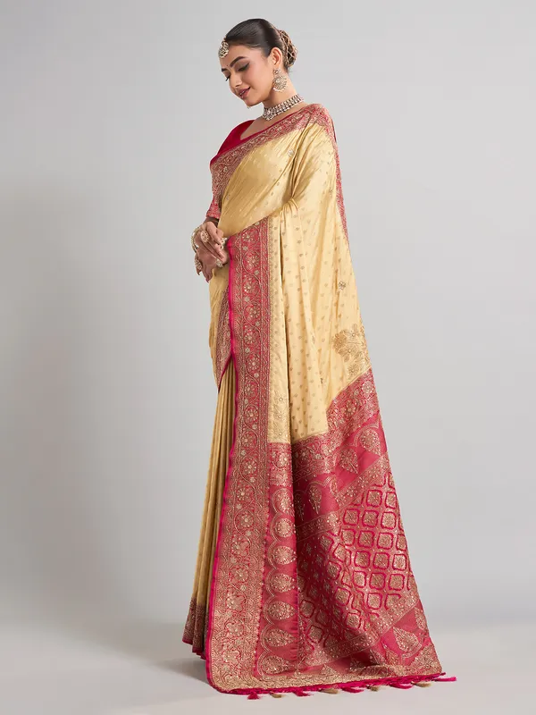 Cream satin silk saree with elegant zari weaving for weddings