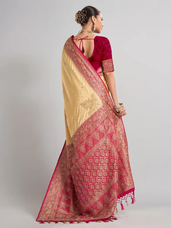 Cream satin silk saree with elegant zari weaving for weddings
