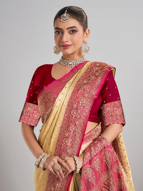 Cream satin silk saree with elegant zari weaving for weddings