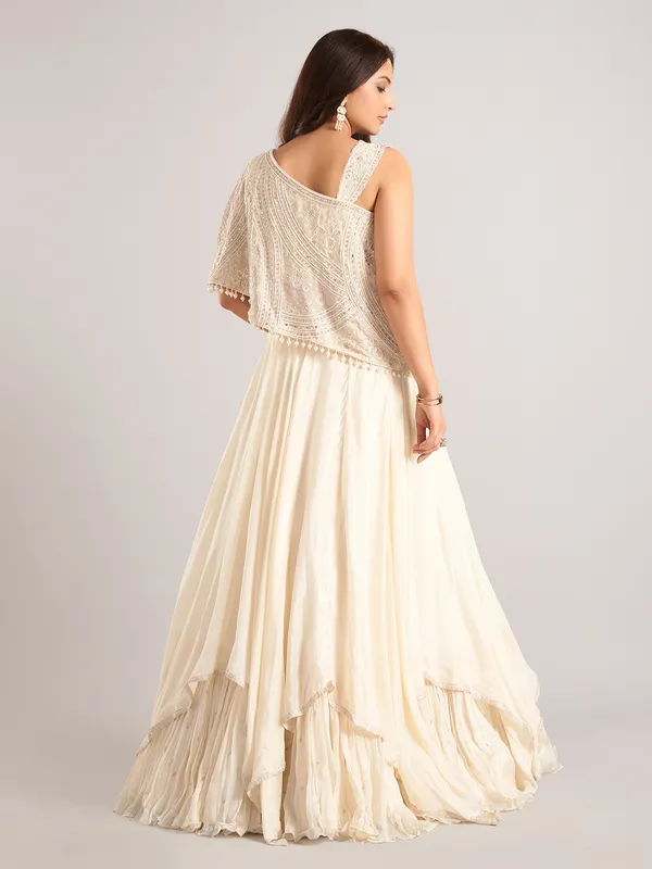 Cream silk designer lehenga choli with mirror work
