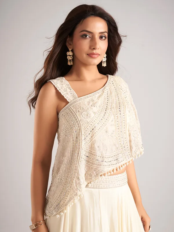 Cream silk designer lehenga choli with mirror work