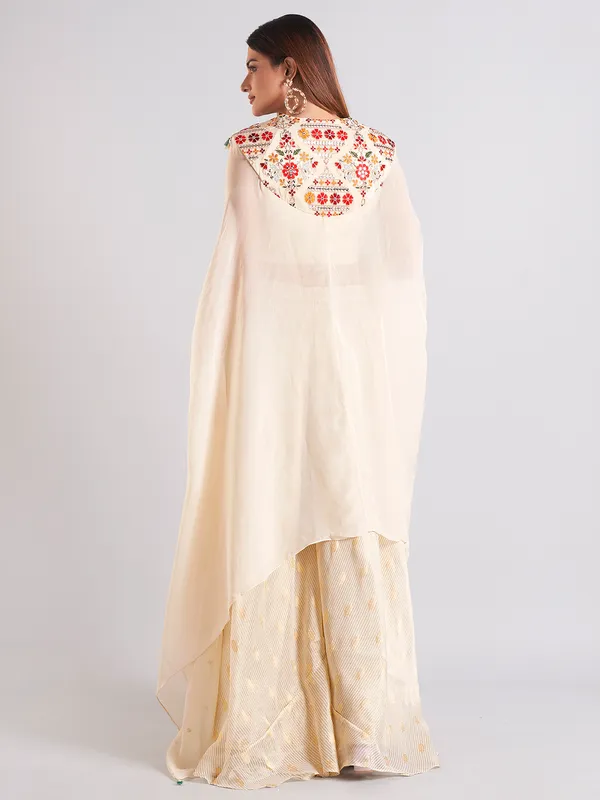 Cream silk embroidery palazzo salwar suit