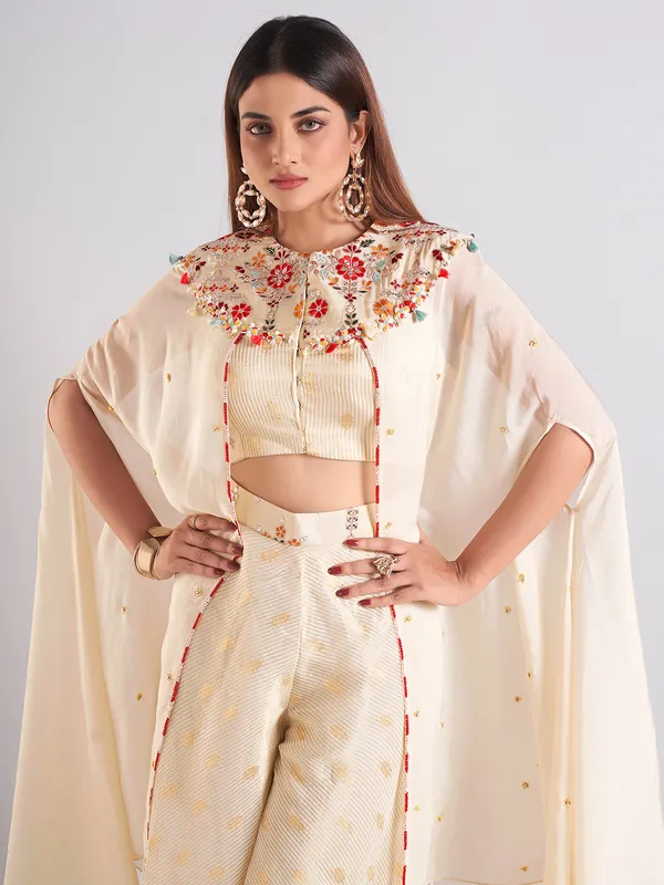 Cream silk embroidery palazzo salwar suit