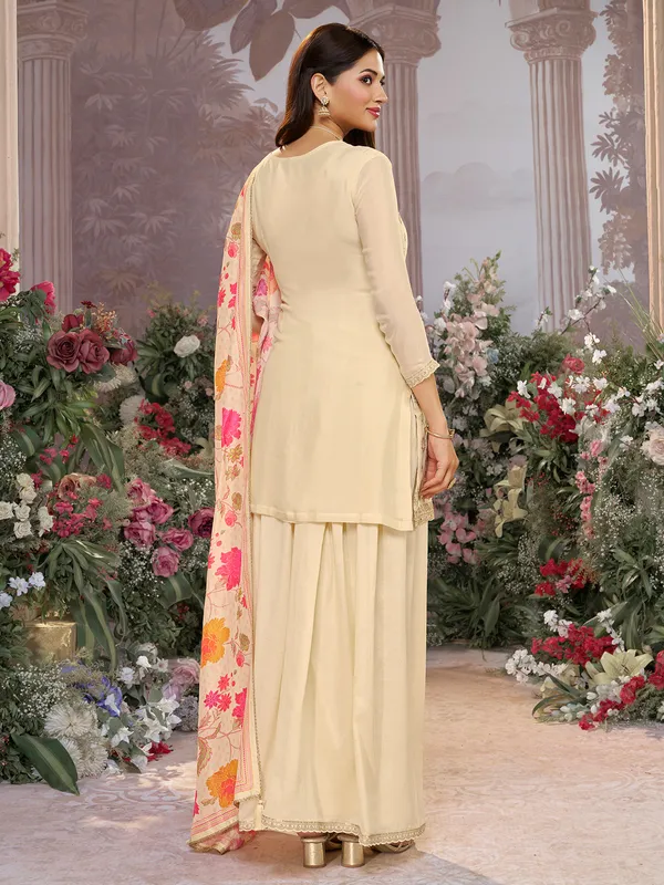 Cream silk festive wear palazzo suit with printed dupatta
