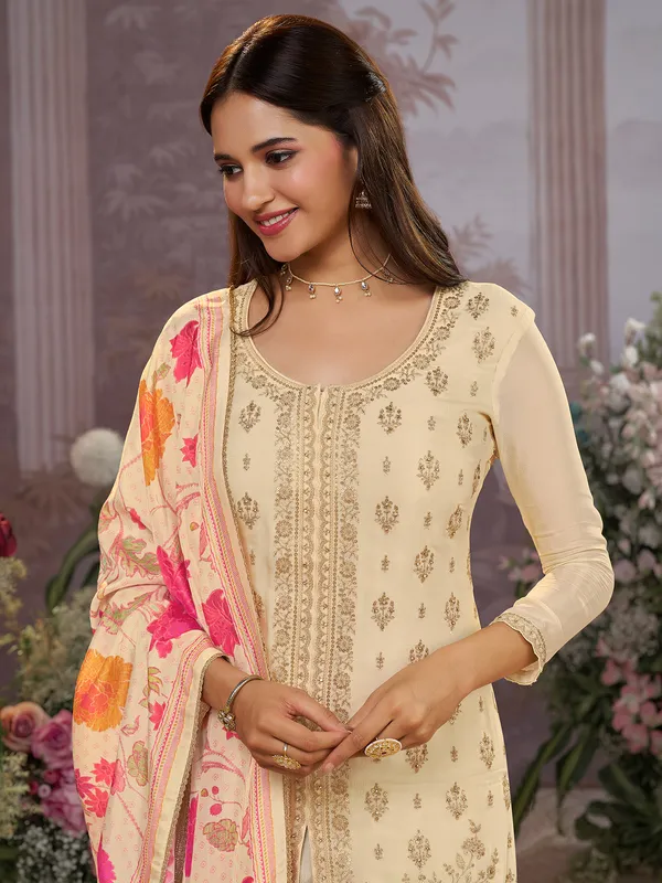 Cream silk festive wear palazzo suit with printed dupatta