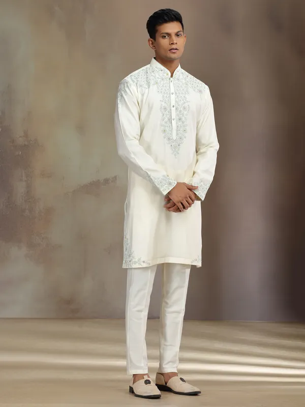 Cream silk kurta suit with sequins and thread detailing