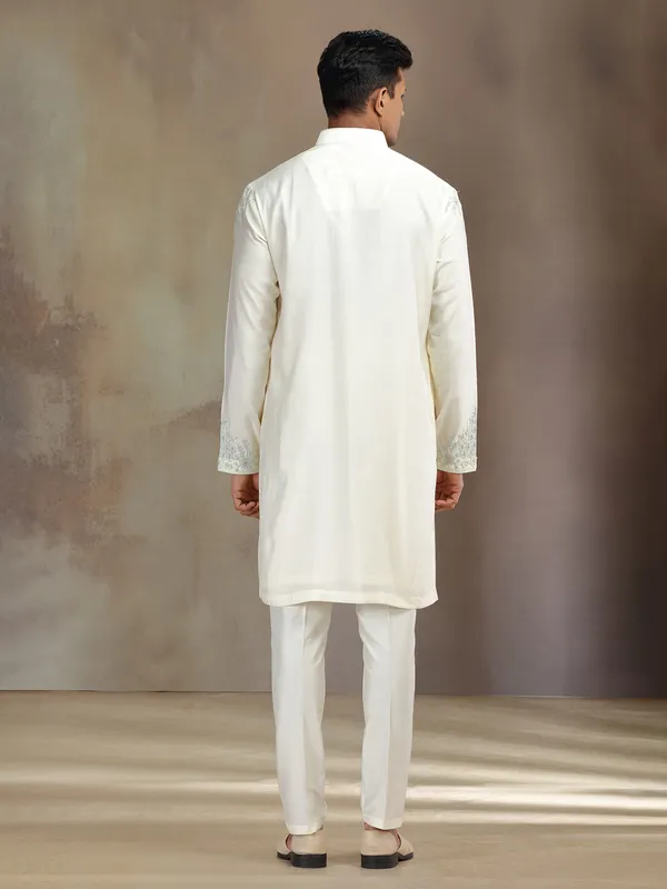 Cream silk kurta suit with sequins and thread detailing