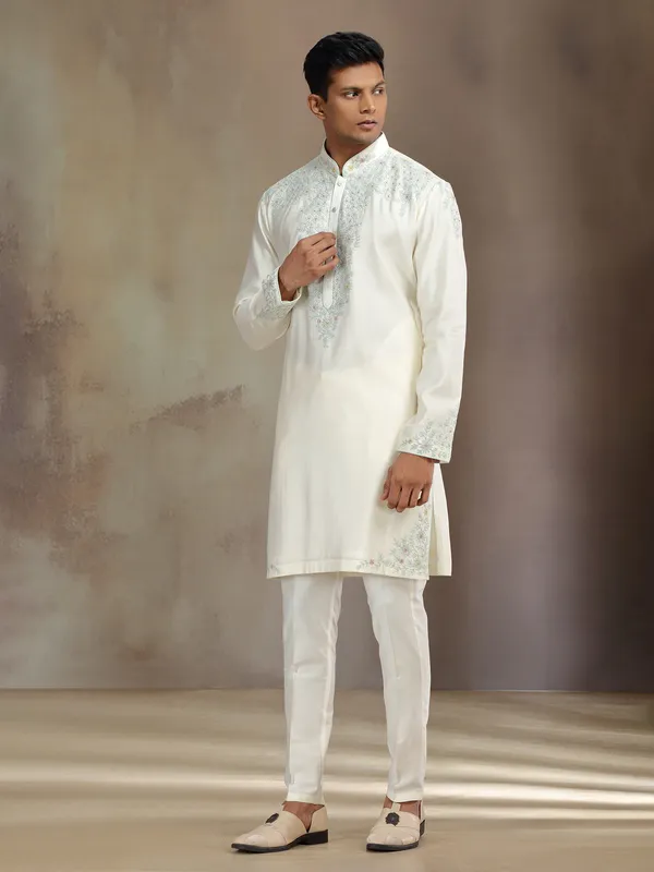Cream silk kurta suit with sequins and thread detailing