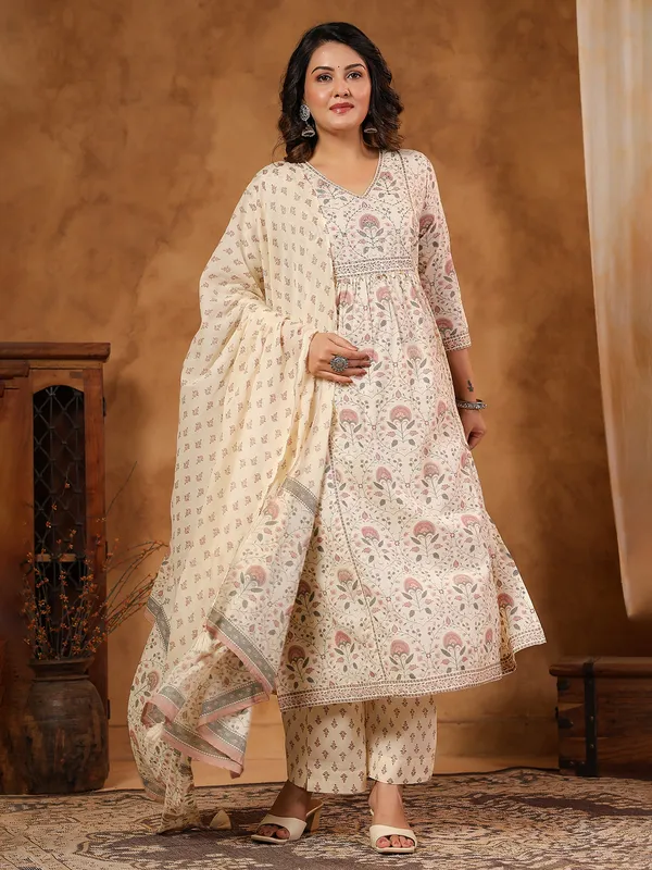 Cream silk kurti set with coin and aabla work