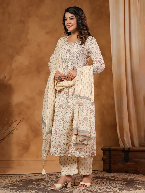 Cream silk kurti set with coin and aabla work