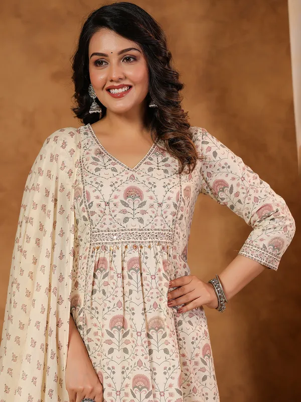 Cream silk kurti set with coin and aabla work