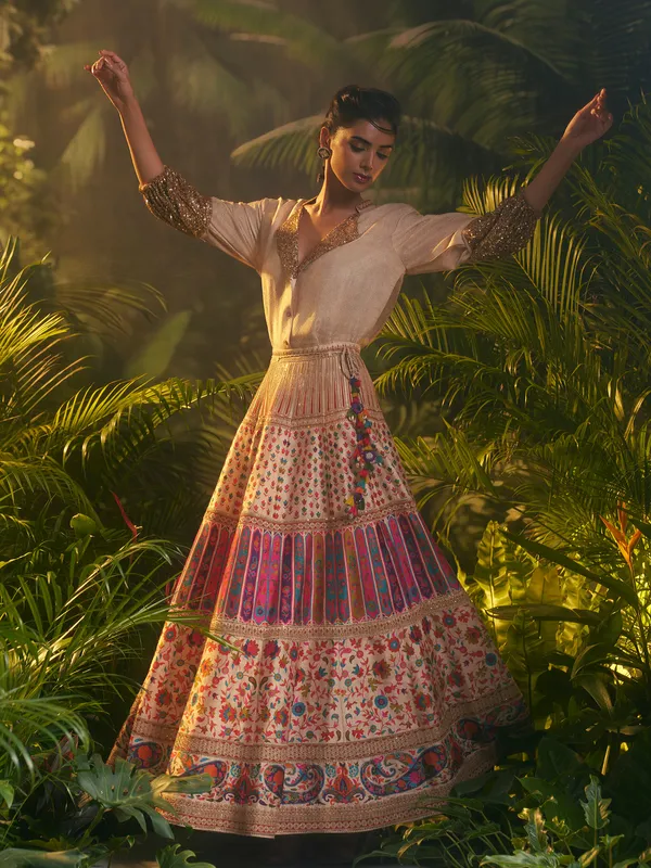 Cream silk lehenga choli for wedding celebration