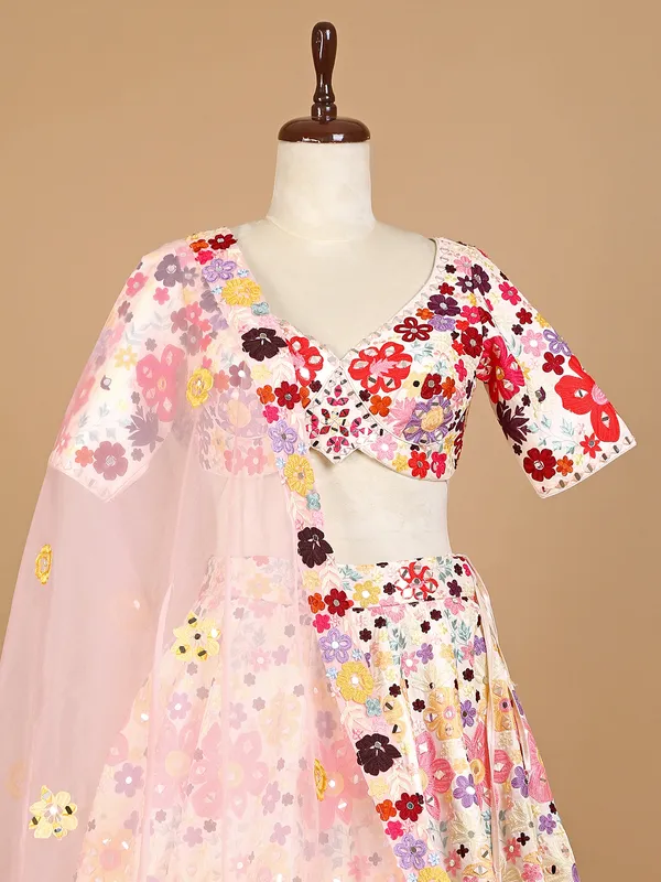 Cream silk lehenga choli with embroidery
