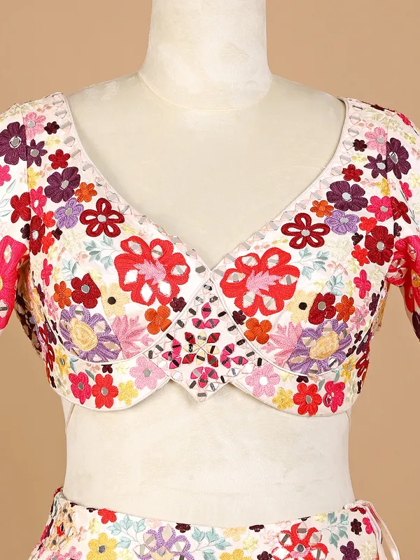 Cream silk lehenga choli with embroidery