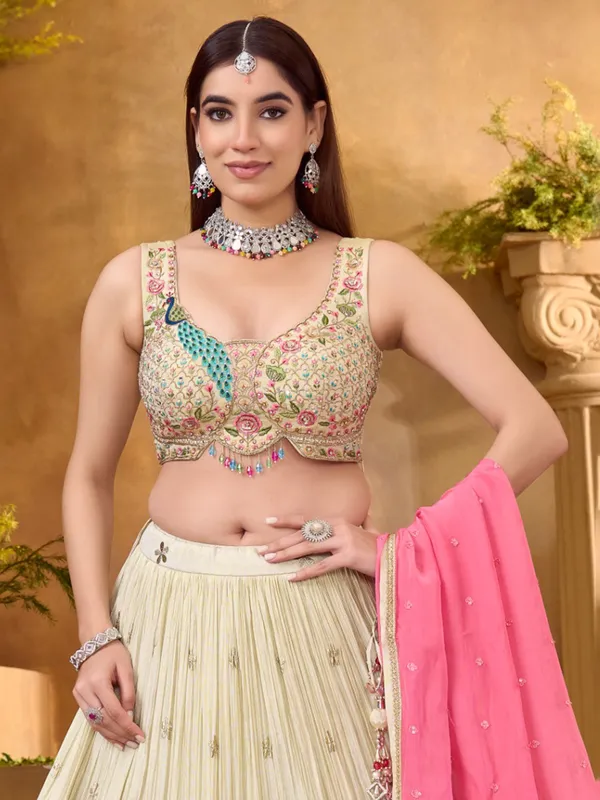 Cream silk lehenga choli with embroidery work